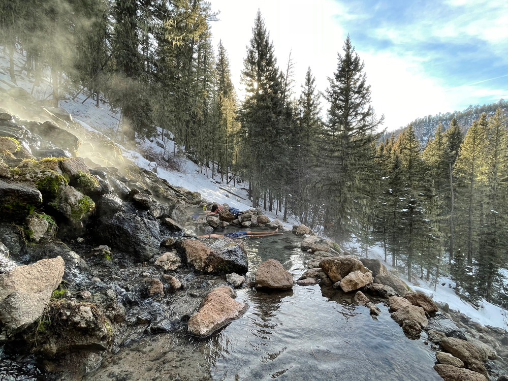 a snowy winter view of San Antonio Hot Springs which is one of the best New Mexico hot springs