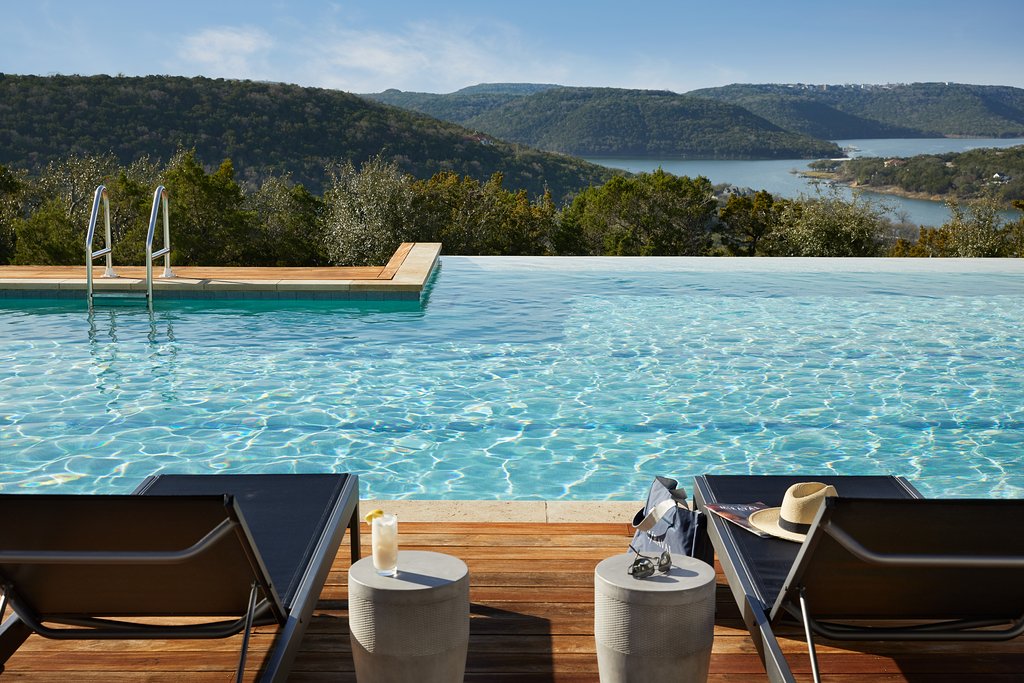 swimming pool overlooking lake in texas at one of the best all inclusive resorts in america