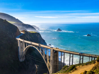 The view of Bixby Bridge with the Pacific Ocean in the back ground. It is the most popular stop on a Big Sur road trip.