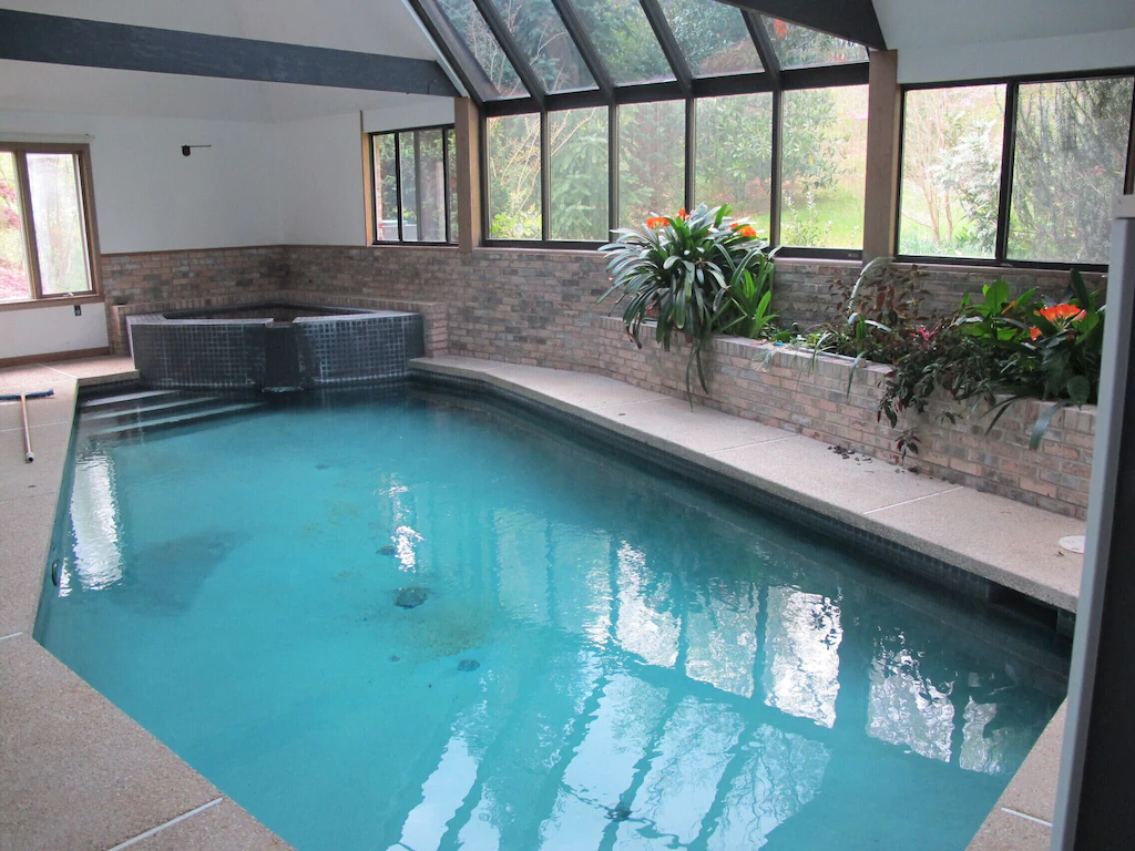 a photo of a french spa in the woods one of the best VRBOS with indoor pools