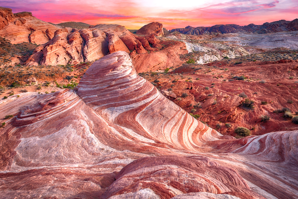 the iconic Fire Wave surrounded by red rock and sunset colors