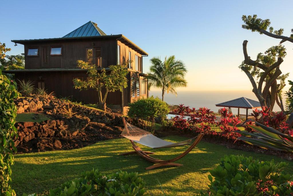 hotel building in beautiful landscaped garden overlooking the ocean  