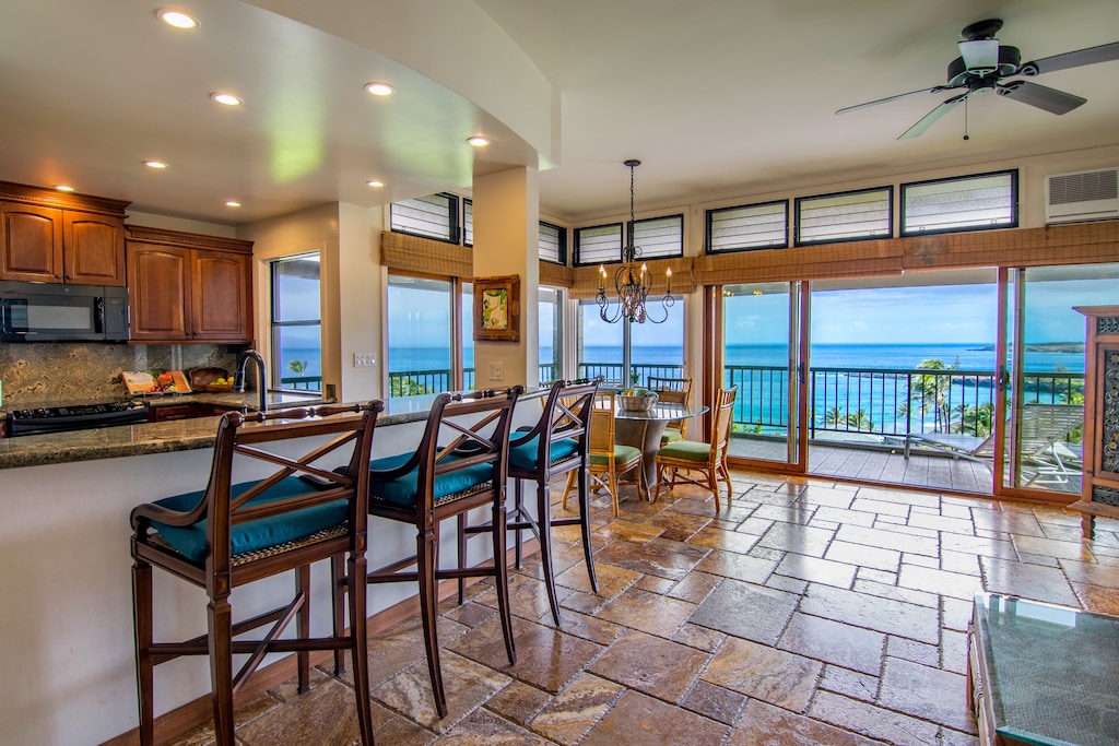 Incredible view of the Pacific from thie kitchen and dining area of the Forever Ocean Views Condo 