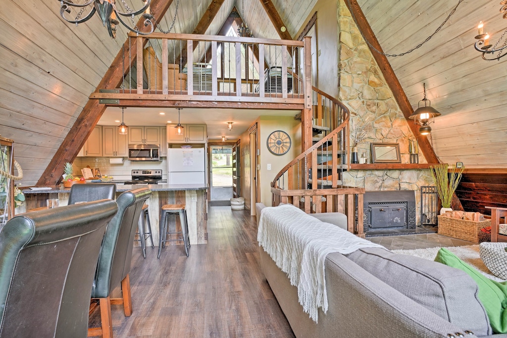 view of the stone and wood interior of the cascade lakes aframe, one of the best cabins in Idaho 