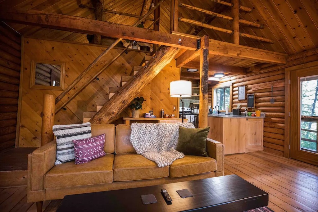 view of the cozy interior of this log cabin 