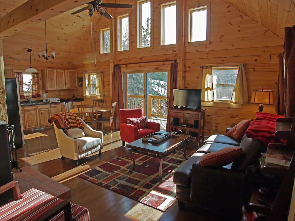 One of the best cabins in Colorado the sinide has the perfect cozt feel. The picture shows the wooden cozy lounge area