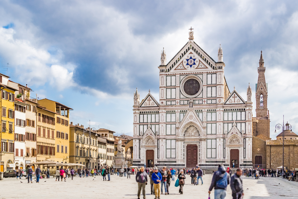 Tourists fill the square in front of the Basilica di Santa Croce.