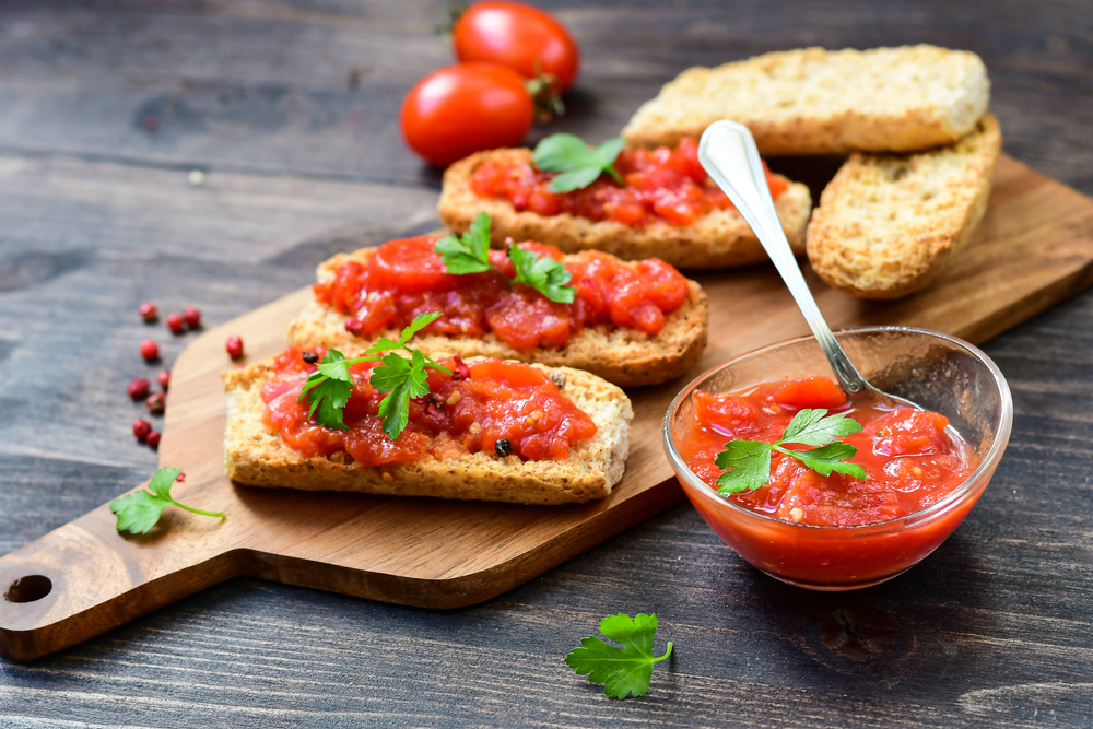 Plate of bruschetta with tomatoes.