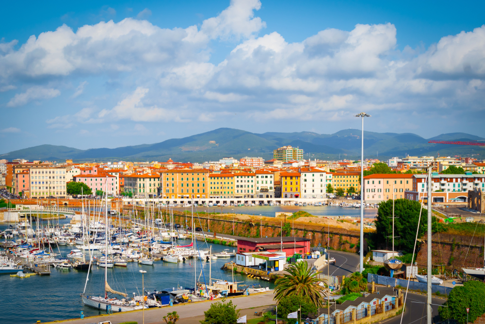 Looking over the colorful town and harbor of Livorno, Tuscany.