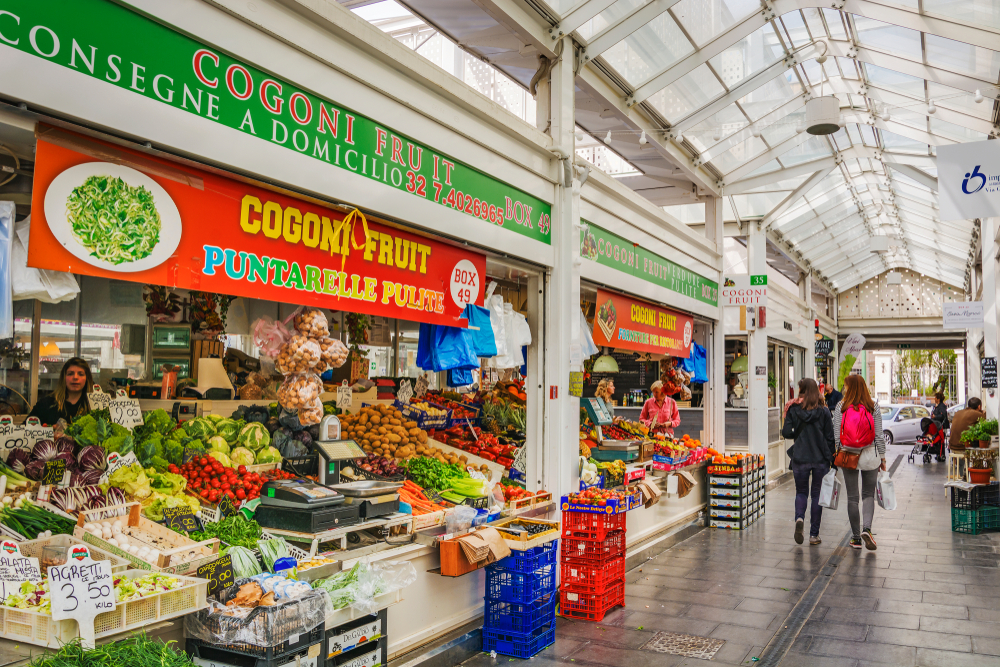 Covered market with fruit stalls in Testaccio, where to stay in Rome.