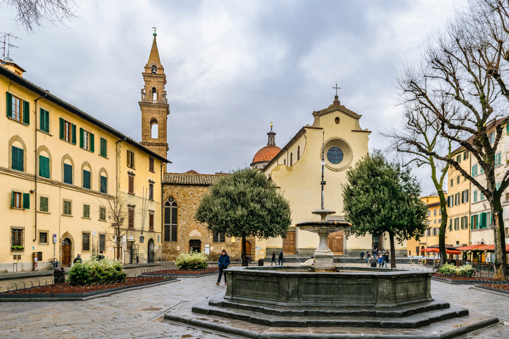 Plaza in front of the Santo Spirito church with a fountain.