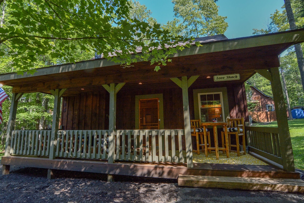 the welcoming and rustic front porch of the love shack