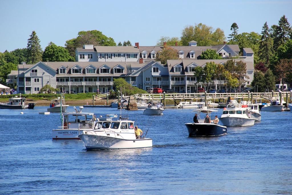 Hotel on the water with boats in the forground in an article about the best resorts on the East Coast 