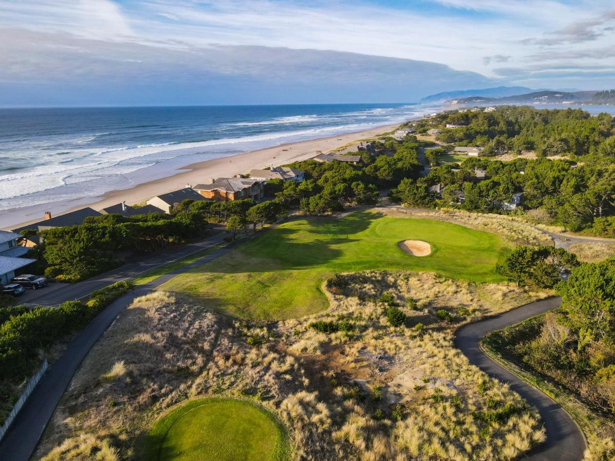 The view of a golf course and the Oregon coast from a room at a resort