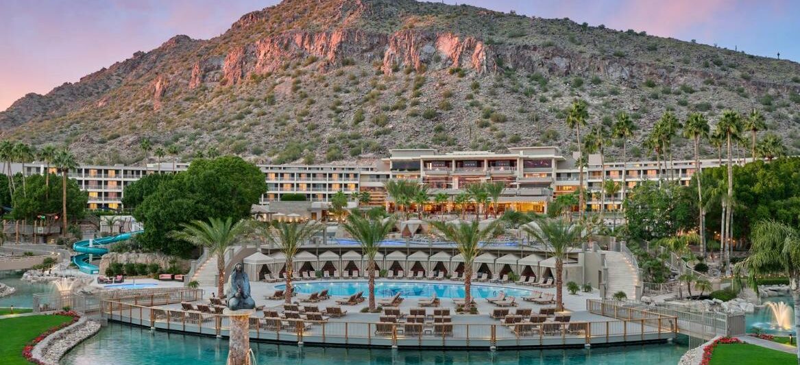 zoomed out view of the pool and resort at The Phoenician with a mountain in the background