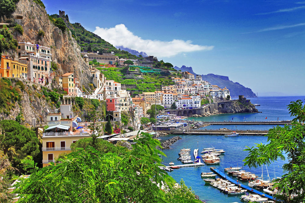 View of the seaside, cliff towns and harbors of the Amalfi Coast, one of the best day trips from Rome.