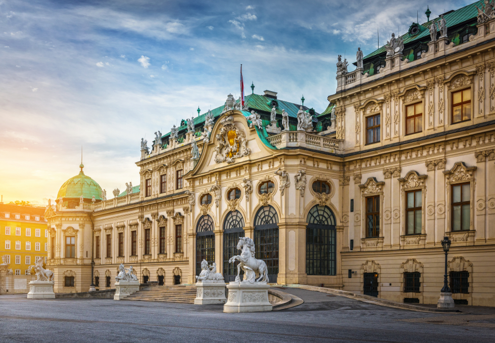 The ornate Belvedere Palace during golden hour in Vienna.