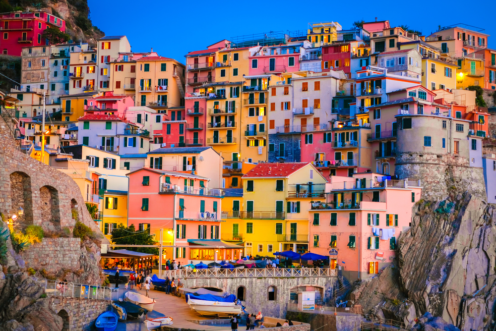 Dusk over the colorful buildings of Cinque Terre in Italy.