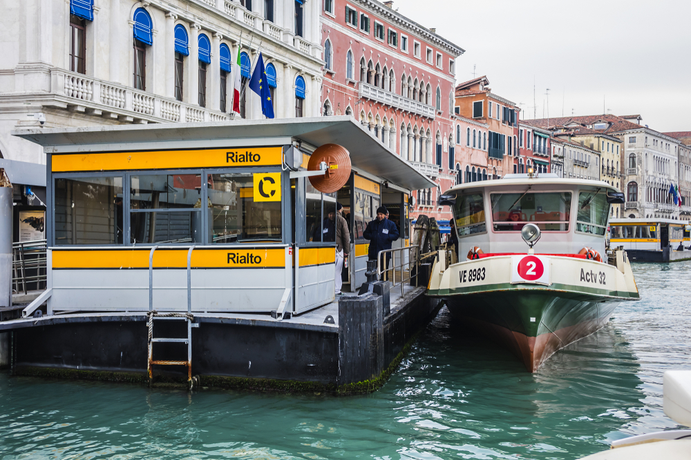 Vaporetto water bus at a stop on the Grand Canal.