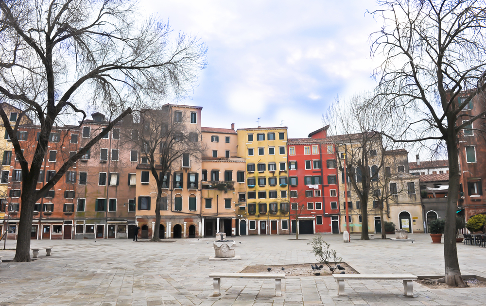 Square in the Venice ghetto with benches and trees seen during 2 days in Venice.