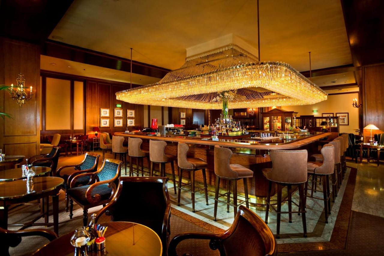 Classy bar area at the InterContinental Wien with glass chandelier.