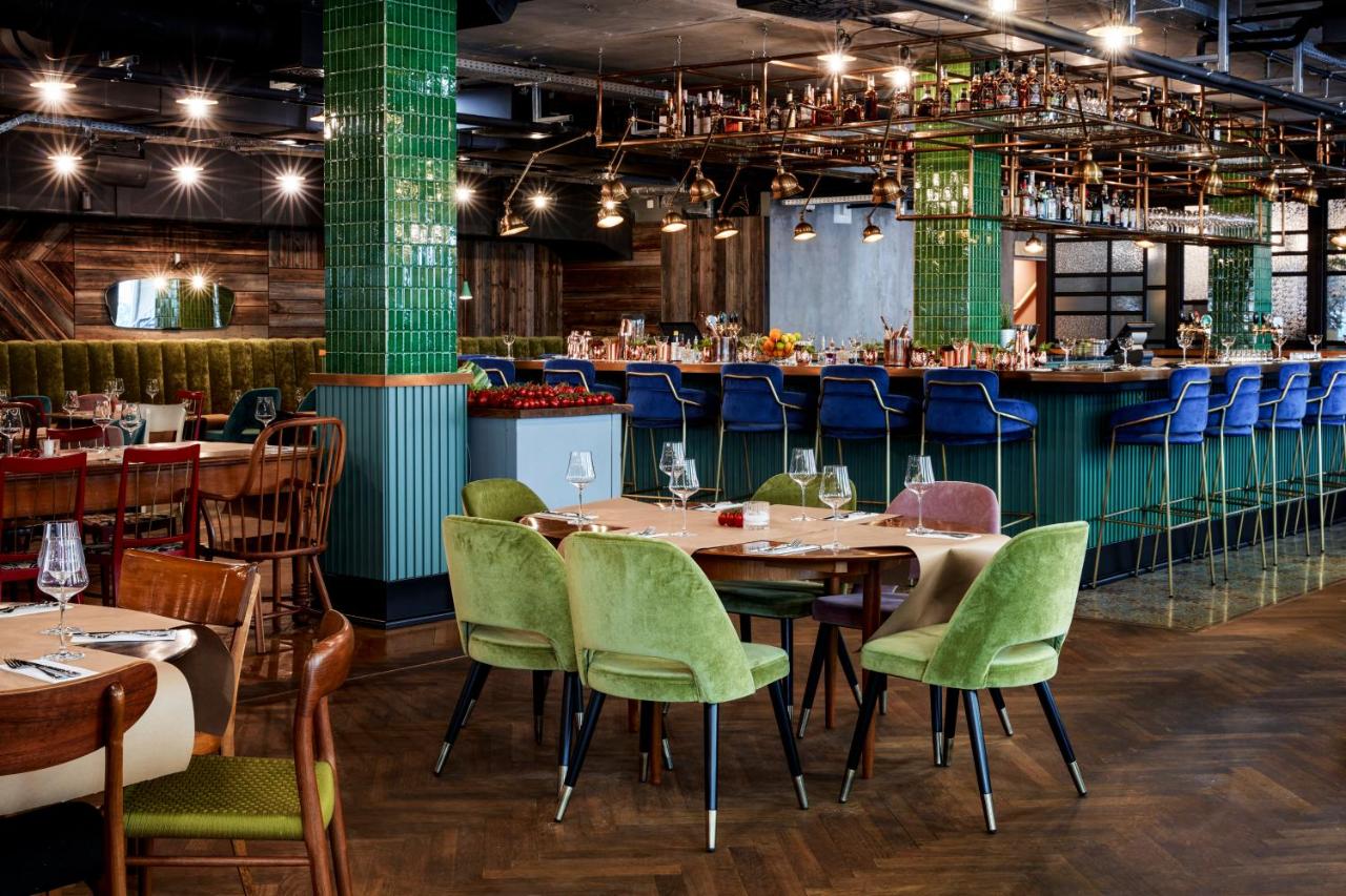 Modern bar area at the Max Brown 7th District hotel in Vienna.