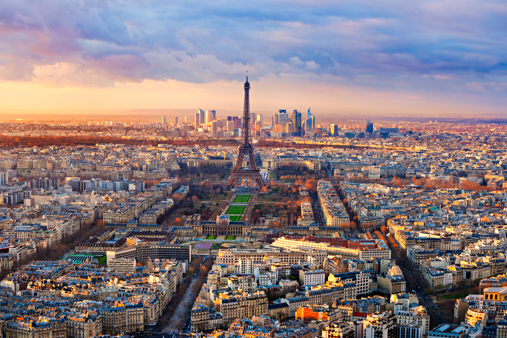 Panoramic view of Paris at sunset as viewed from the top of the Montparnasse Tower.