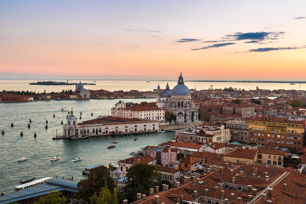 Sunset view of Venice seen from the top of the Campanile di San Marco Bell Tower.