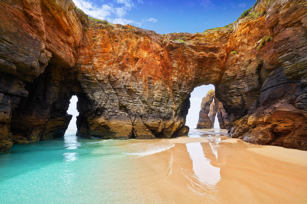 As Catedrais Beach is one of the best beaches in the world, and is famous for its low tide views that reveal tons of sand corridors perfect for exploring.