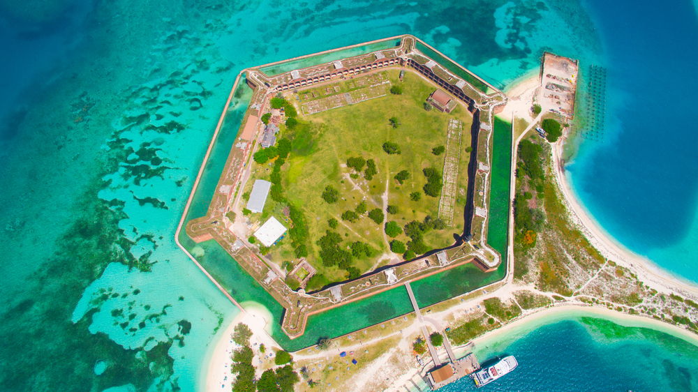Dry Tortugas National Park is a national park that is one of the best beaches in the world that features nearby coral reefs, historical fots and more.
