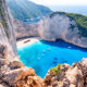 Navagio Beach is one of the best beaches in the world with its cove, nearby walking cliffs, shipwreck and more!