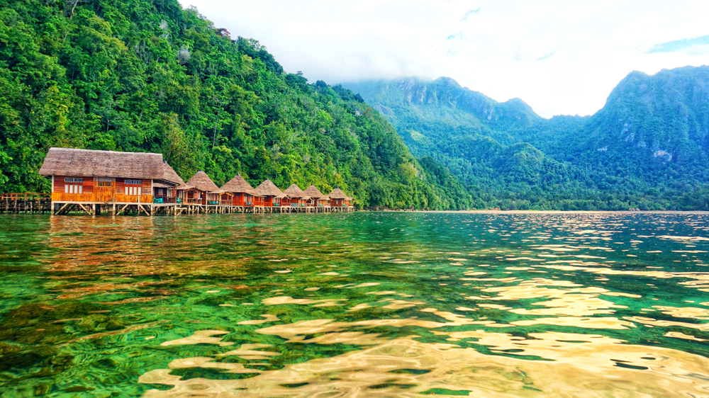 The 6 villages that sit in the water at Ora Beach make this one of the best beaches in the world because of their unique nature. The clear water and ability to see straight to the coral reefs helps too! 