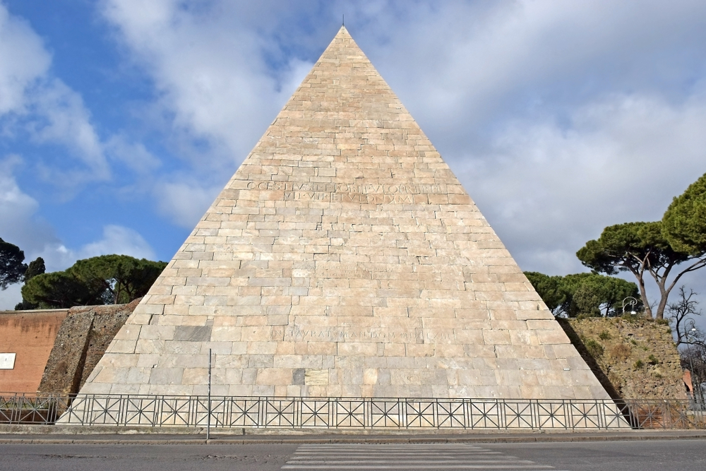 The stone Pyramid of Gaius Cestius seen during 4 days in Rome.