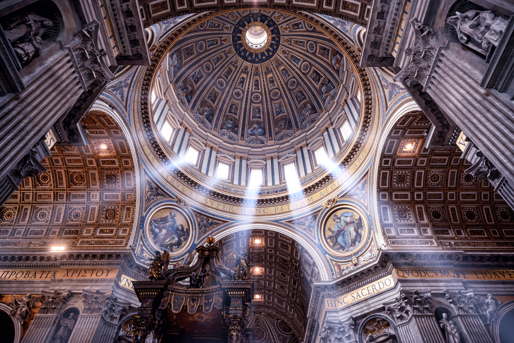 Inside Saint Peter's Basilica, looking up at the dome.