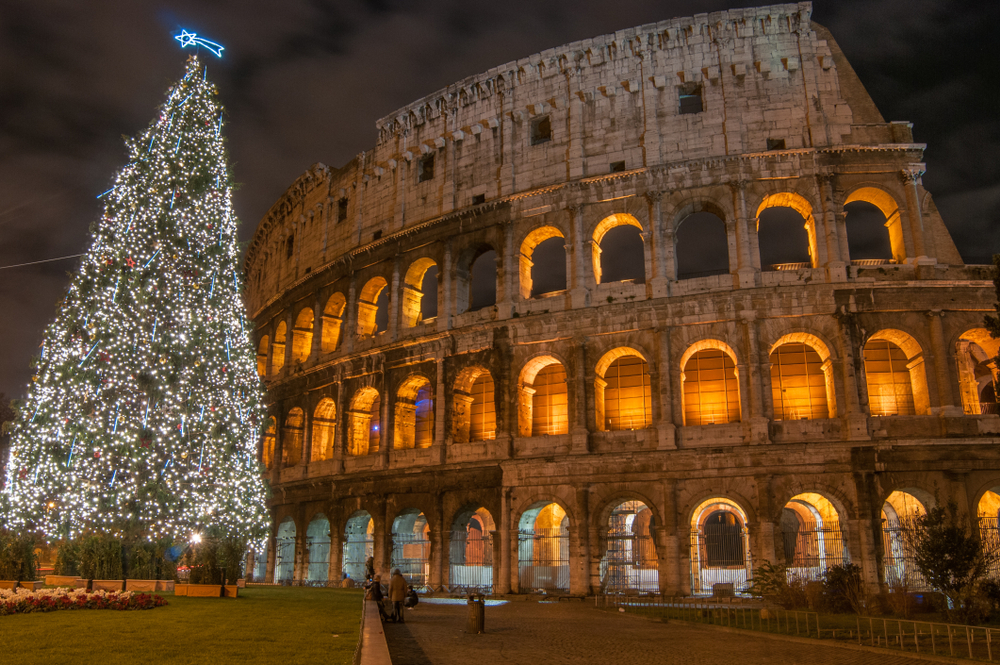 Night in Rome, Christmas tree near Colosseum in an article about the best time to go to Italy. 
