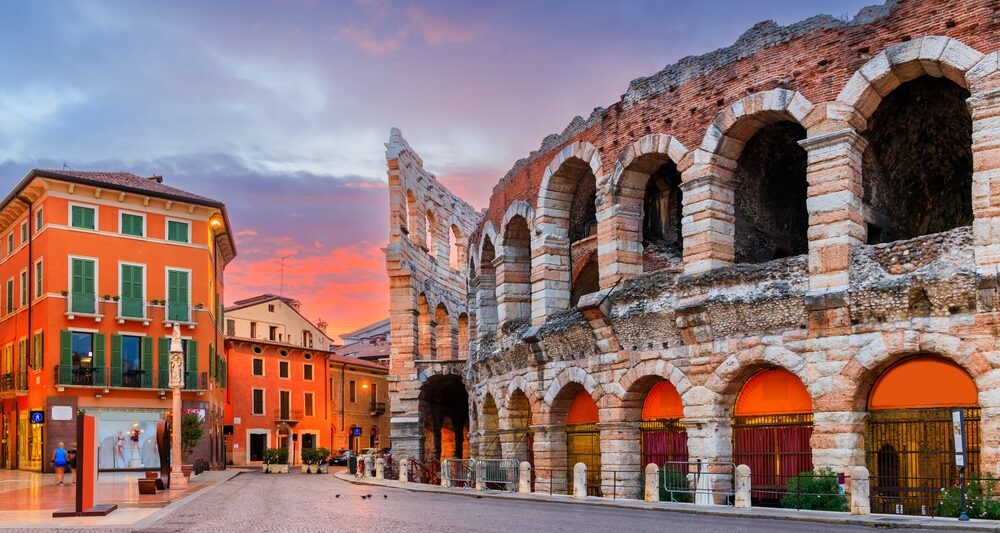 sunset on a street with ruins showing one of the best times to visit italy