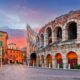 sunset on a street with ruins showing one of the best times to visit italy