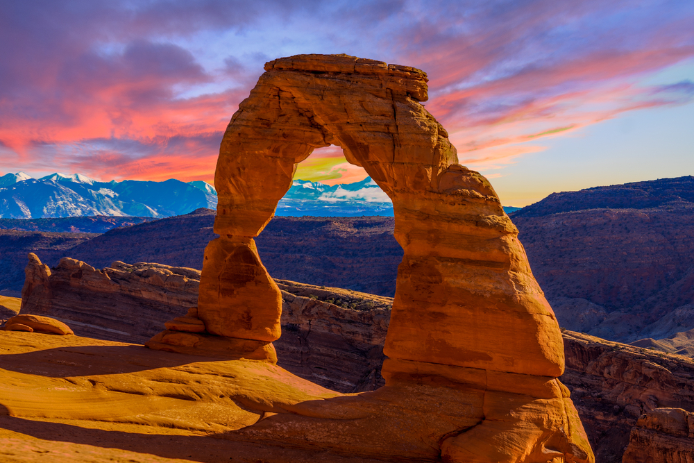 Utah National Park at sunset with orange landscapes. This is one of the best summer vacations in the USA 