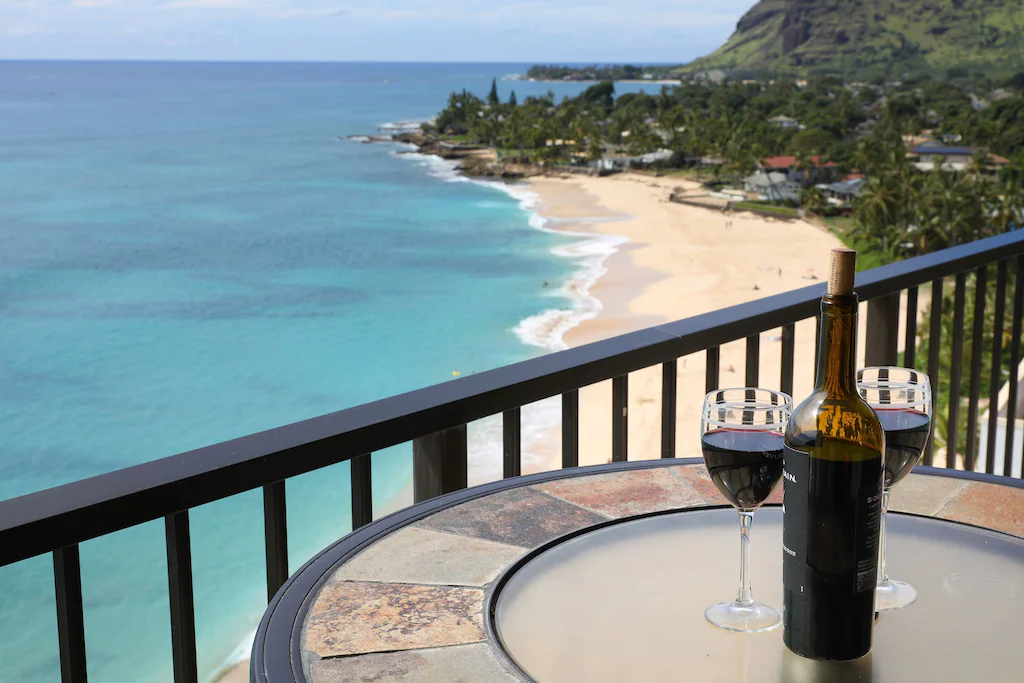 View of the amazing panoramic beach and ocean view from the wrap around lanai of the oceanfront condo 