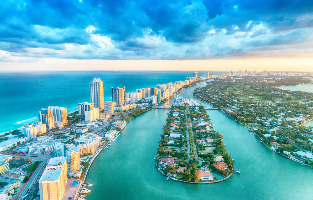 Miami from the sky with the beautiful water and buildings showing 