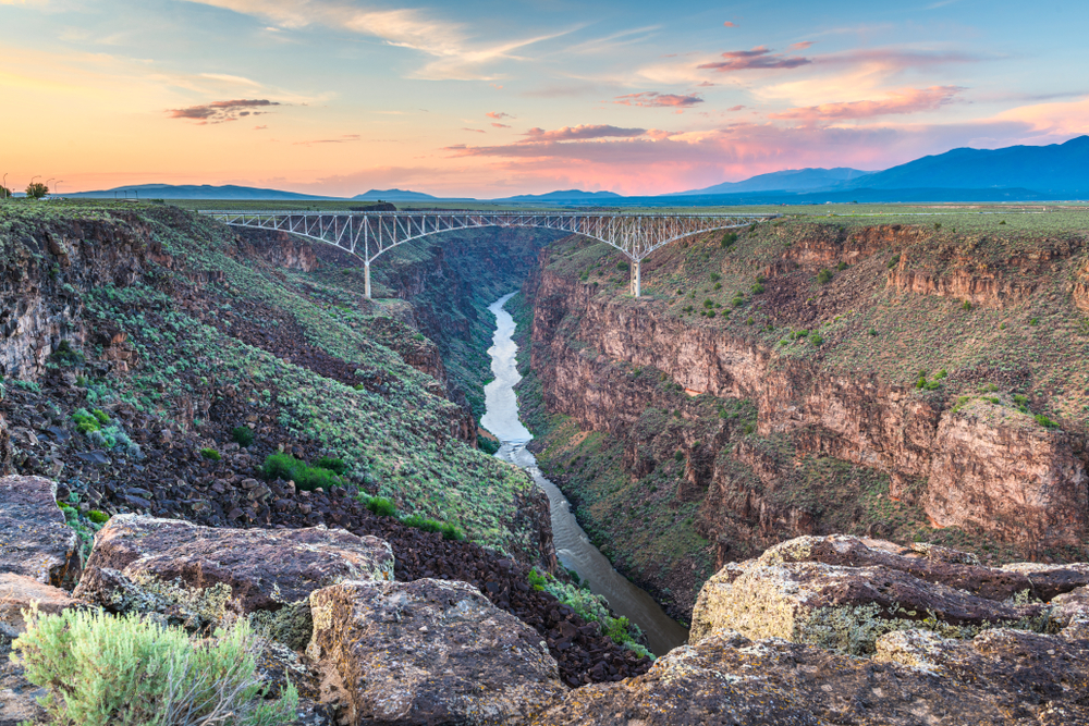 Taos new Mexicos section of the rio grande bridge. visting here is one of the best winter vacations in the USA