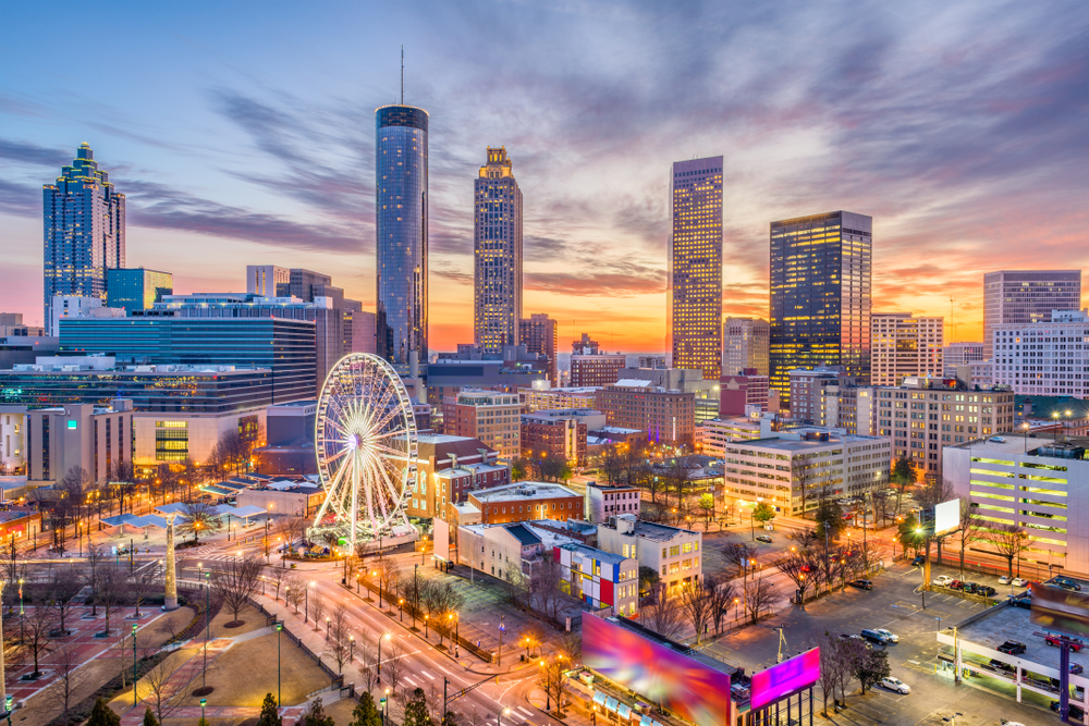 the city downtown Atlanta skyline at night with lights