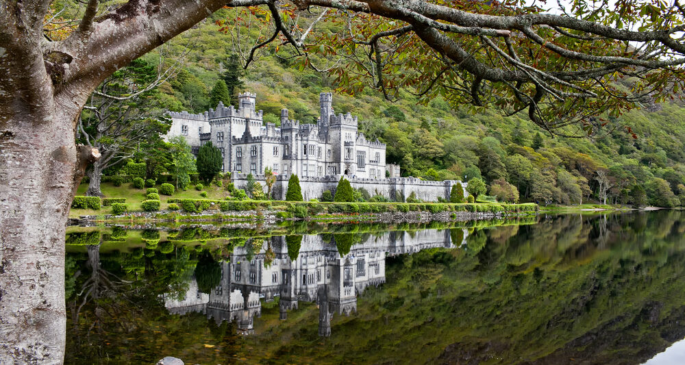 castle on a lake in ireland showing the best time to go to ireland for weather