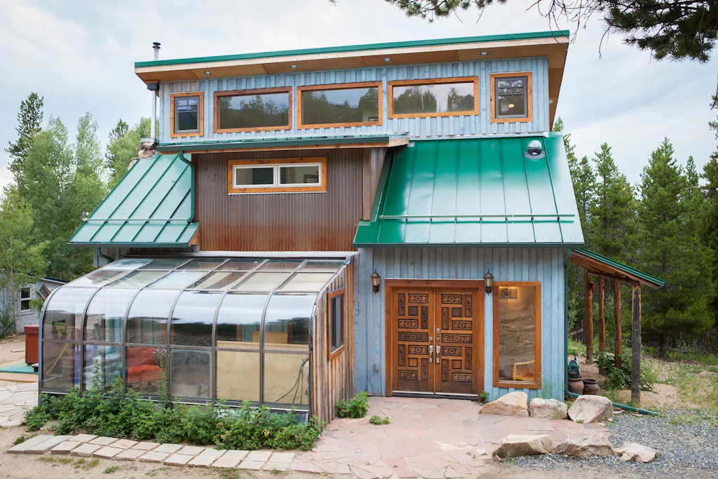 view of the eclectic exterior of the artistic home