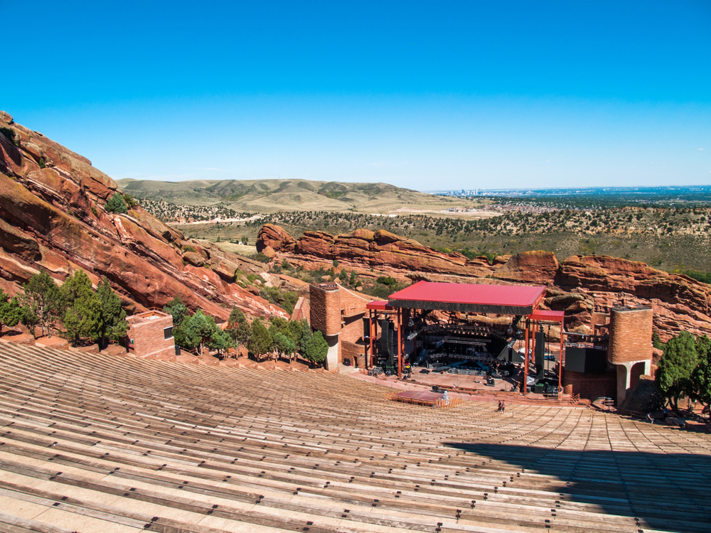 Red Rocks Amphitheater on a clear day with views of the stage.