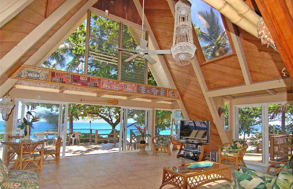 View of the stunningly beautiful tropical wooden A frame and its amazing views to the ocean beyond