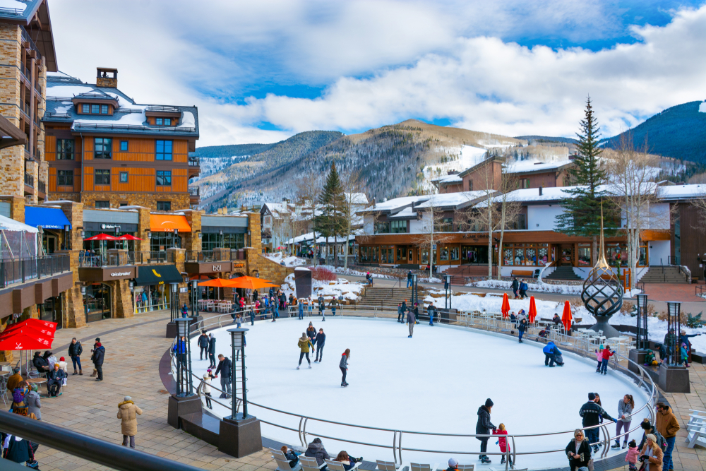 People ice skating on a rink in Vail.