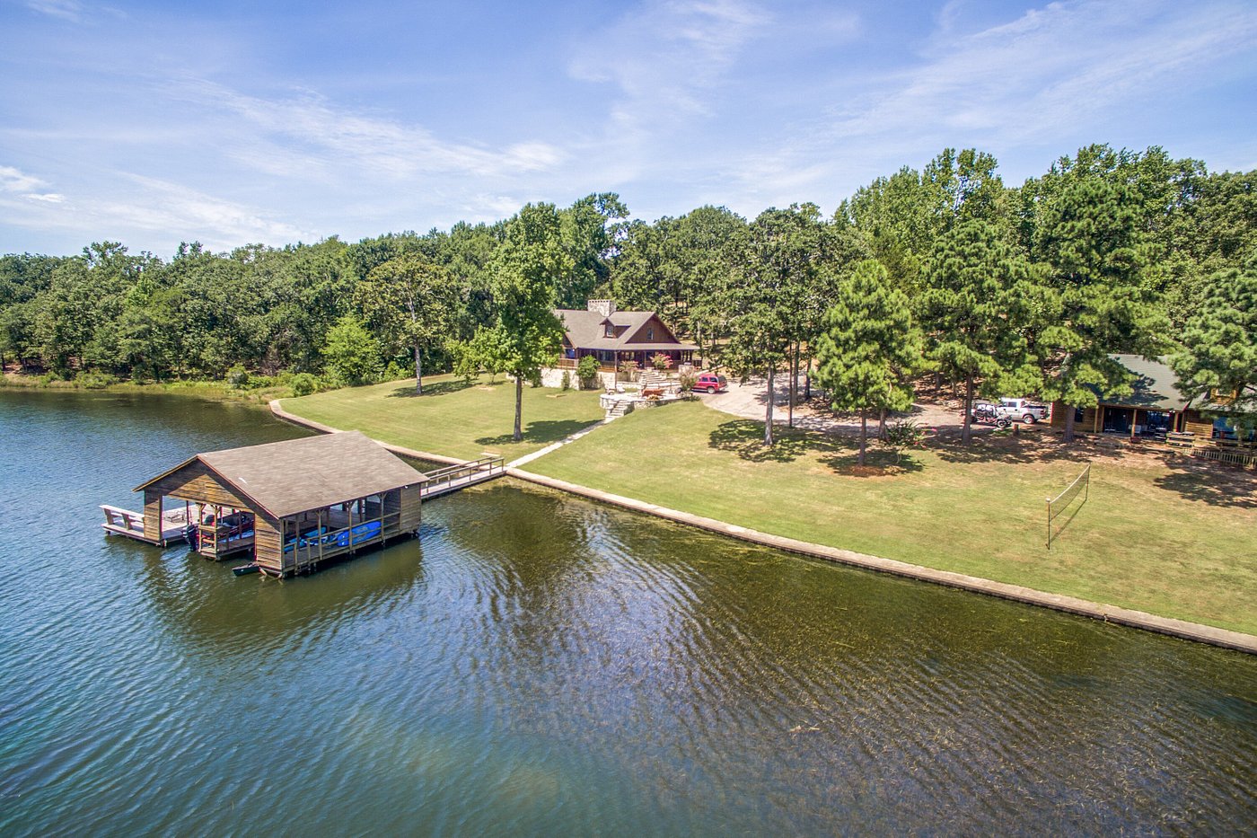 aerial image of green grass, different buildings in a large boathouse with the best option for all inclusive resorts in texas