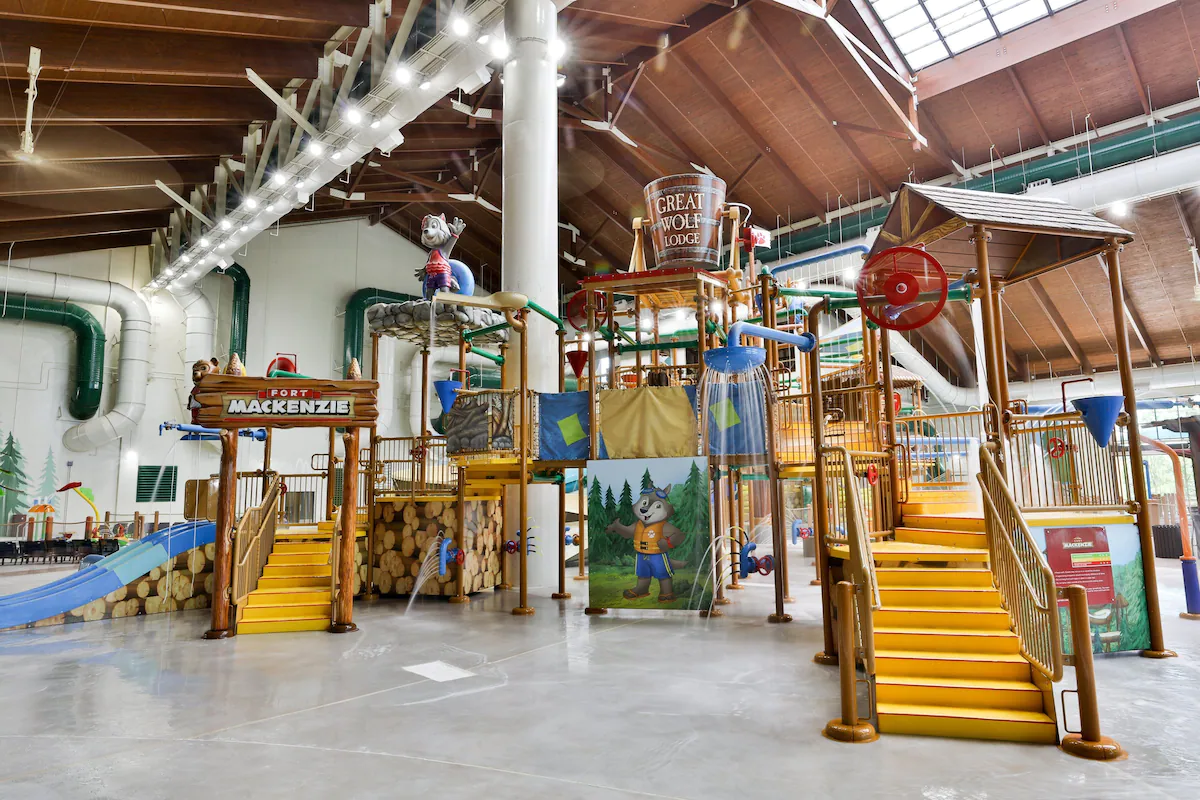 fun and log themed water play area featured in the child's area of great wolf lodge inner water park! Definitely a must consider for all inclusive resorts in Texas!