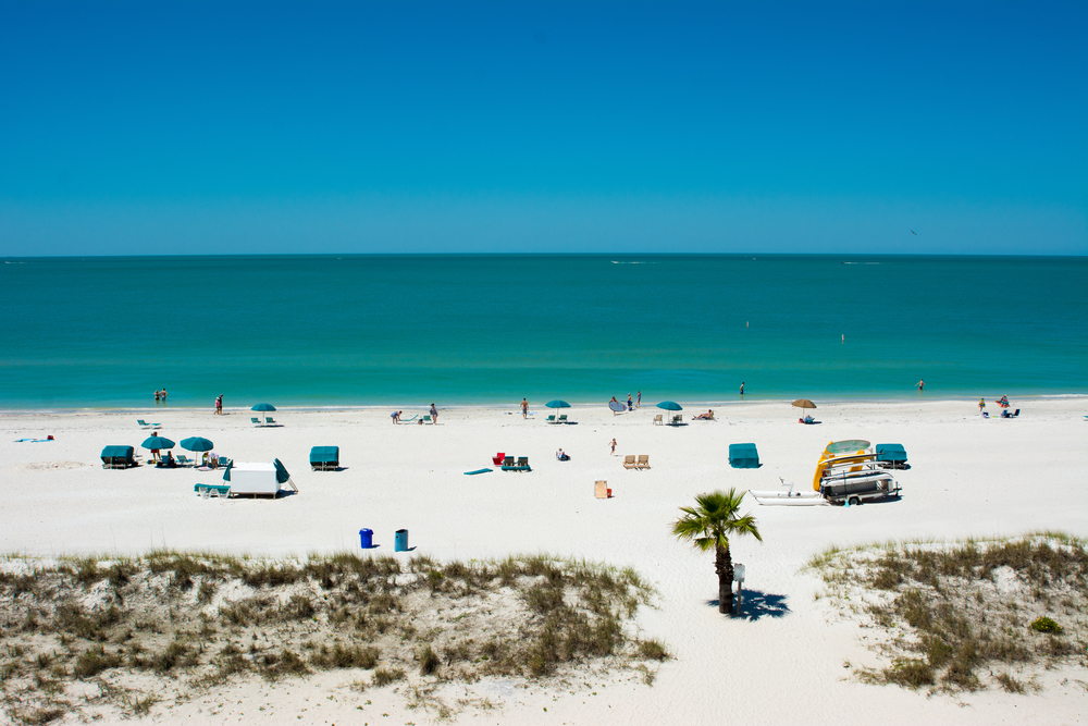 The stunning white sand, blue water, and rentals for comfort show that Treasure island is a great place to visit.